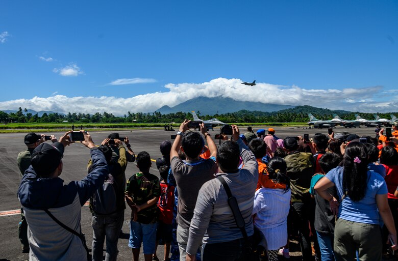 U.S. Air Force Capt. Jake “Primo” Impellizzeri, Pacific Air Forces’ F-16 Demonstration Team commander, performs a high-speed pass during the Cope West 19 open house at Sam Ratulangi International Airport, Manado, Indonesia June 22, 2019. The Cope West 19 open house was one of many events throughout 2019 celebrating the 70th anniversary of diplomatic relations between the U.S. and Indonesia. The Cope West 19 open house provided an opportunity for the local communities around Manado to engage with their nation’s military and a key partnering nation. (U.S. Air Force photo by Staff Sgt. Melanie A Hutto)