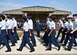 U.S. Air Force Col. Andres Nazario, 17th Training Wing commander, salutes the formation during the pass in review portion of the 17th TRW change of command ceremony at the parade field on Goodfellow Air Force Base, Texas, June 28, 2019. The pass in review is a military tradition meant as a way for a new commander to inspect the troops. (U.S. Air Force photo by Staff Sgt. Chad Warren/Released)