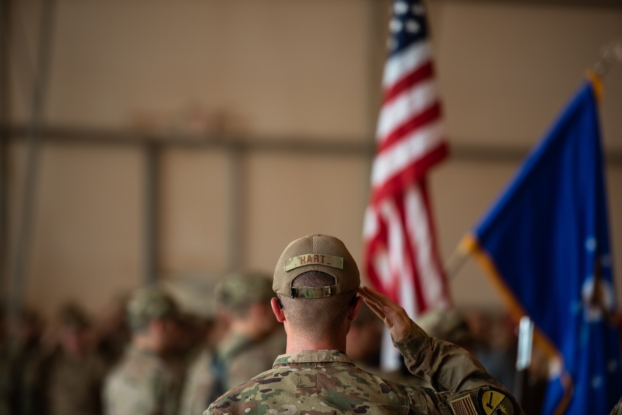 U.S. Air Force 1st Lt. Michael Hart, 724th Expeditionary Air Base Squadron logistics readiness flight commander, salutes the American flag during the 409th Air Expeditionary Group change of command ceremony at Air Base 201, Niger, June 28, 2019. The change of command recognized Col. Steven P. Bording for his leadership, and welcomed the new commander, Col. Jonathan M. Creer. (U.S. Air Force photo by Staff Sgt. Devin Boyer)