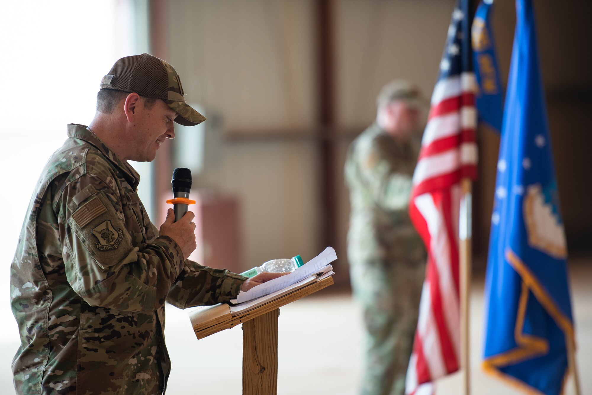 U.S. Air Force Col. Steven P. Bording, 409th Air Expeditionary Group commander, gives his first speech to the group during the change of command ceremony at Air Base 201, Niger, June 28, 2019. After Creer’s remarks, he gave his first salute to the group. (U.S. Air Force photo by Staff Sgt. Devin Boyer)