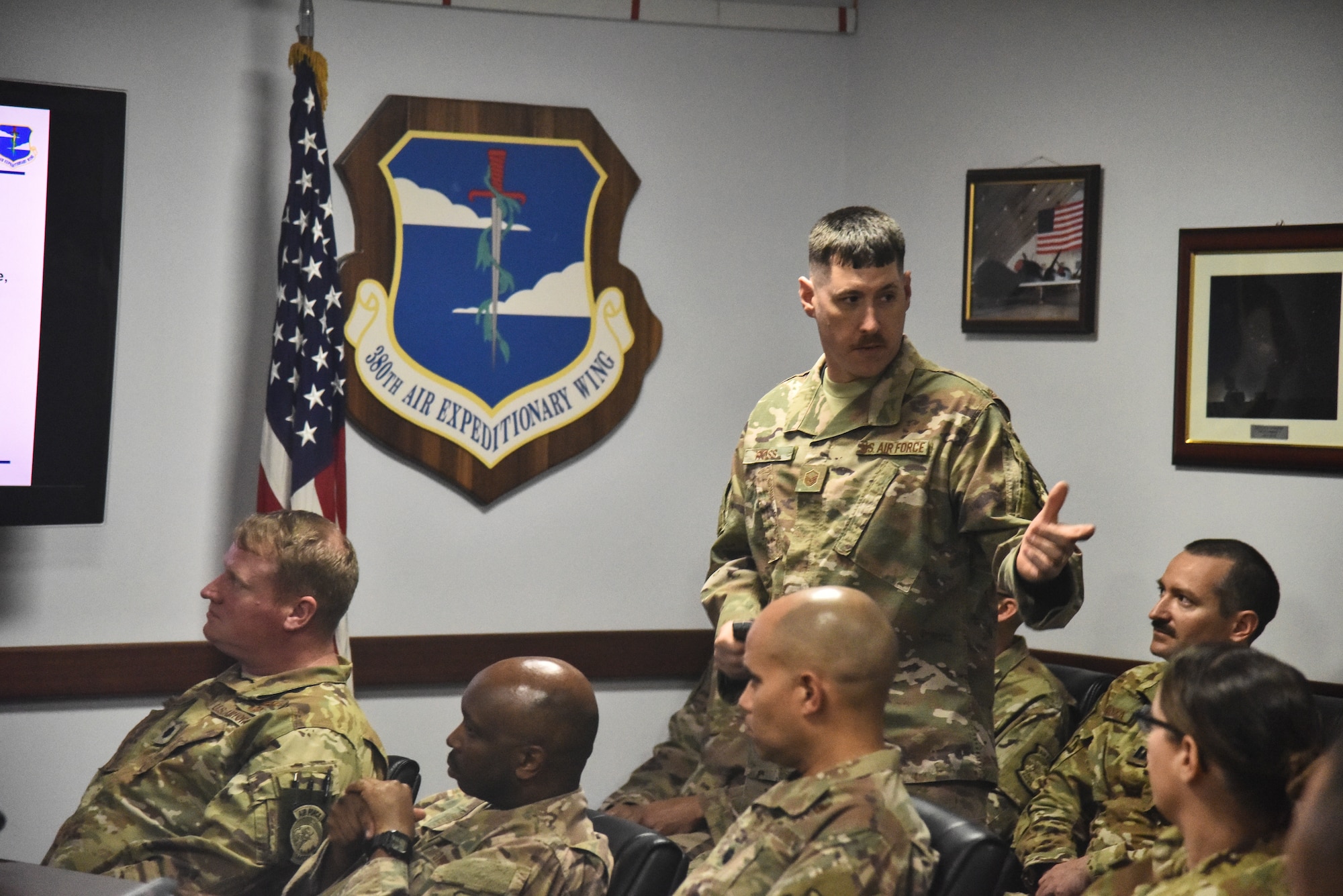 Master Sgt. James Ross, 380th Air Expeditionary Wing weapons safety manager briefs 380th AEW commanders, chiefs and leaders at Al Dhafra Air Base, United Arab Emirates, Feb. 28, 2019. The 380th Air Expeditionary Wing safety shop at Al Dhafra Air Base, United Arab Emirates, is divided into three sections – flight, occupational and weapons. These sections each oversee the safety ranging from the Airmen constantly working to the lethal machines such as hand grenades. (U.S. Air Force photo by Senior Airman Mya M. Crosby)