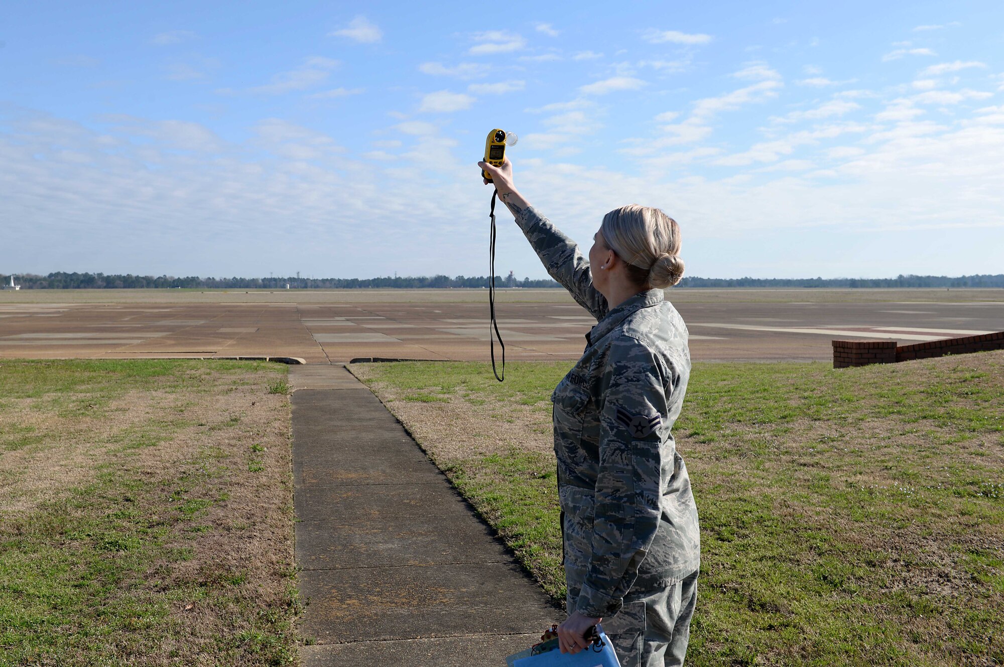 Airman 1st Class Lauren Rodgers, 14th Operations Support Squadron Weather Flight apprentice, gauges the wind with an anemometer Feb. 27, 2019, on Columbus Air Force Base, Mississippi. Anemometers are used to measure wind speed. (U.S. Air Force photo by Airman Hannah Bean)