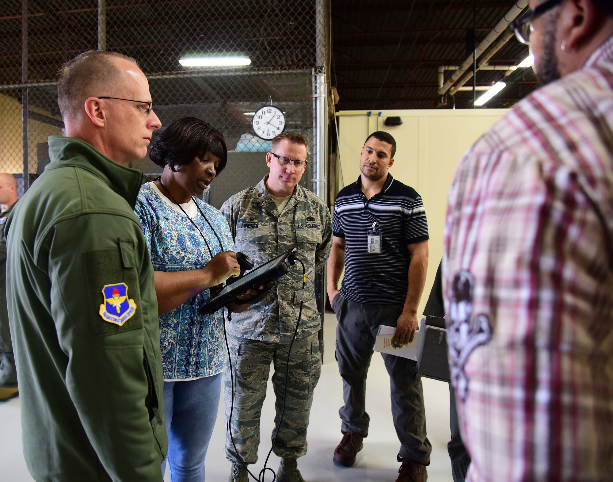 Maj. Gen. Mark Weatherington, deputy commander of Air Education and Training Command, watches the inventory scanner in action Feb. 21, 2019, on Columbus Air Force Base, Mississippi. The 14th Logistics Readiness Squadron renovated their floor, implemented a new scanning system for inventory, and reorganized their warehouse to increase efficiency across the board. (U.S. Air Force photo by Elizabeth Owens)