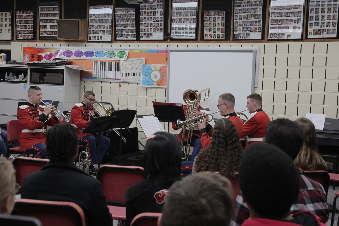On Feb. 26, 2019, a brass quintet from "The President's Own" U.S. Marine Band presented a Music in the High Schools performance at Eleanor Roosevelt High School in Greenbelt, Md. (U.S. Marine Corps photo by Master Sgt. Kristin duBois/released)