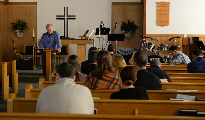 Chaplain (Col.) Doug Slater, Air Education and Training Command chaplain, from Joint Base San Antonio-Randolph, Texas, reads a section of the bible to attendees during service at the BLAZE Chapel Feb. 24, 2019, on Columbus Air Force Base, Mississippi. During the sermon, Chaplain Slater spoke to the audience about God’s love and reminisced about his time as a teenager learning about God and how one small event initiated a chain reaction that led him to become who he is today. (U.S. Air Force photo by Airman Hannah Bean)