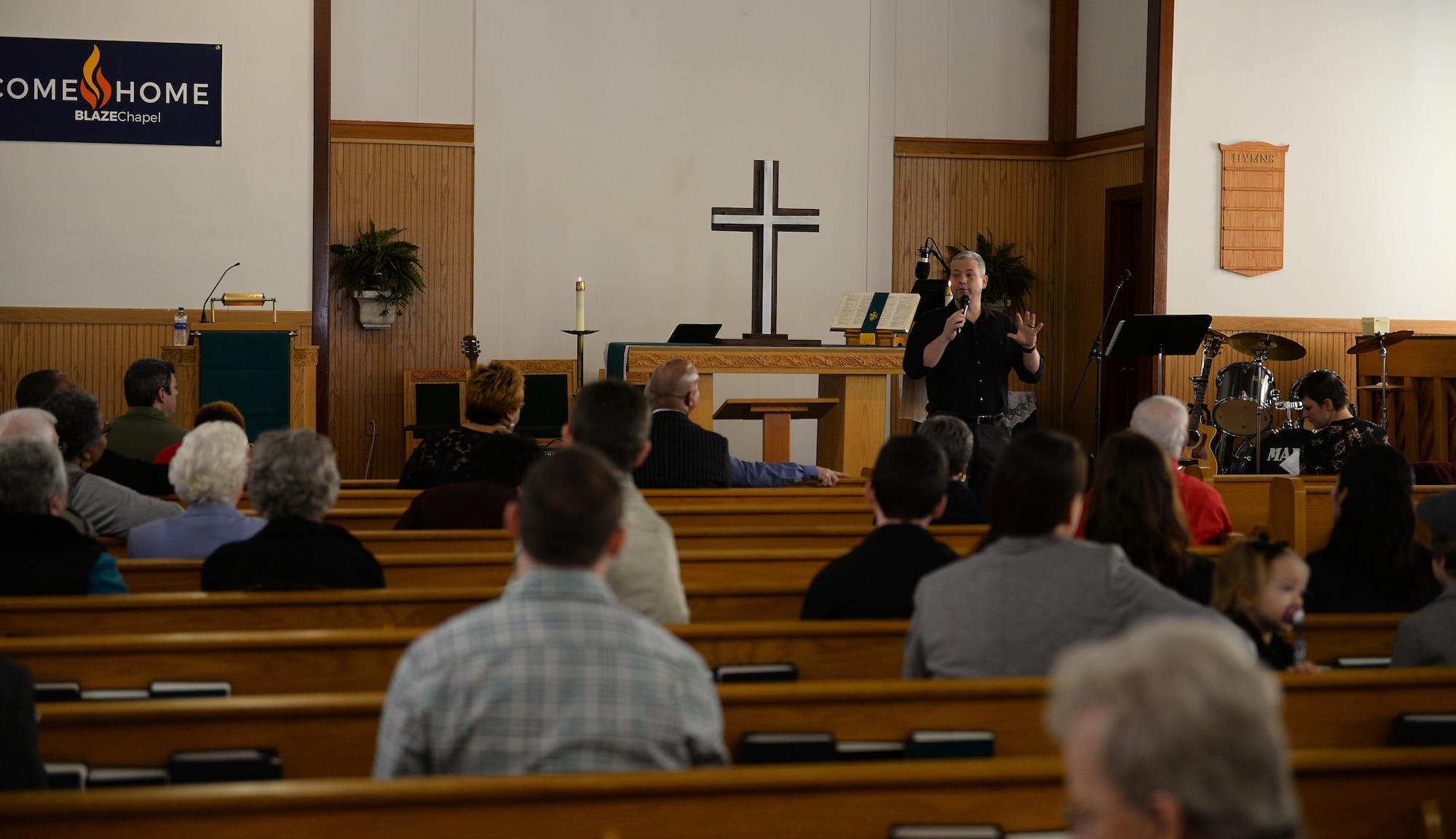 Chaplain (Lt. Col.) Richardson, 14th Flying Training Wing chaplain, welcomes attendees and introduces Chaplain (Col.) Doug Slater, Air Education and Training Command chaplain, from Joint Base San Antonio-Randolph, Texas, during service Feb. 24, 2019, on Columbus Air Force Base, Mississippi. After hearing so many positive reports about the Columbus Chapel’s ministries, Chaplain Slater was thrilled to be invited to preach his final Air Force sermon at Columbus. (U.S. Air Force photo by Airman Hannah Bean)