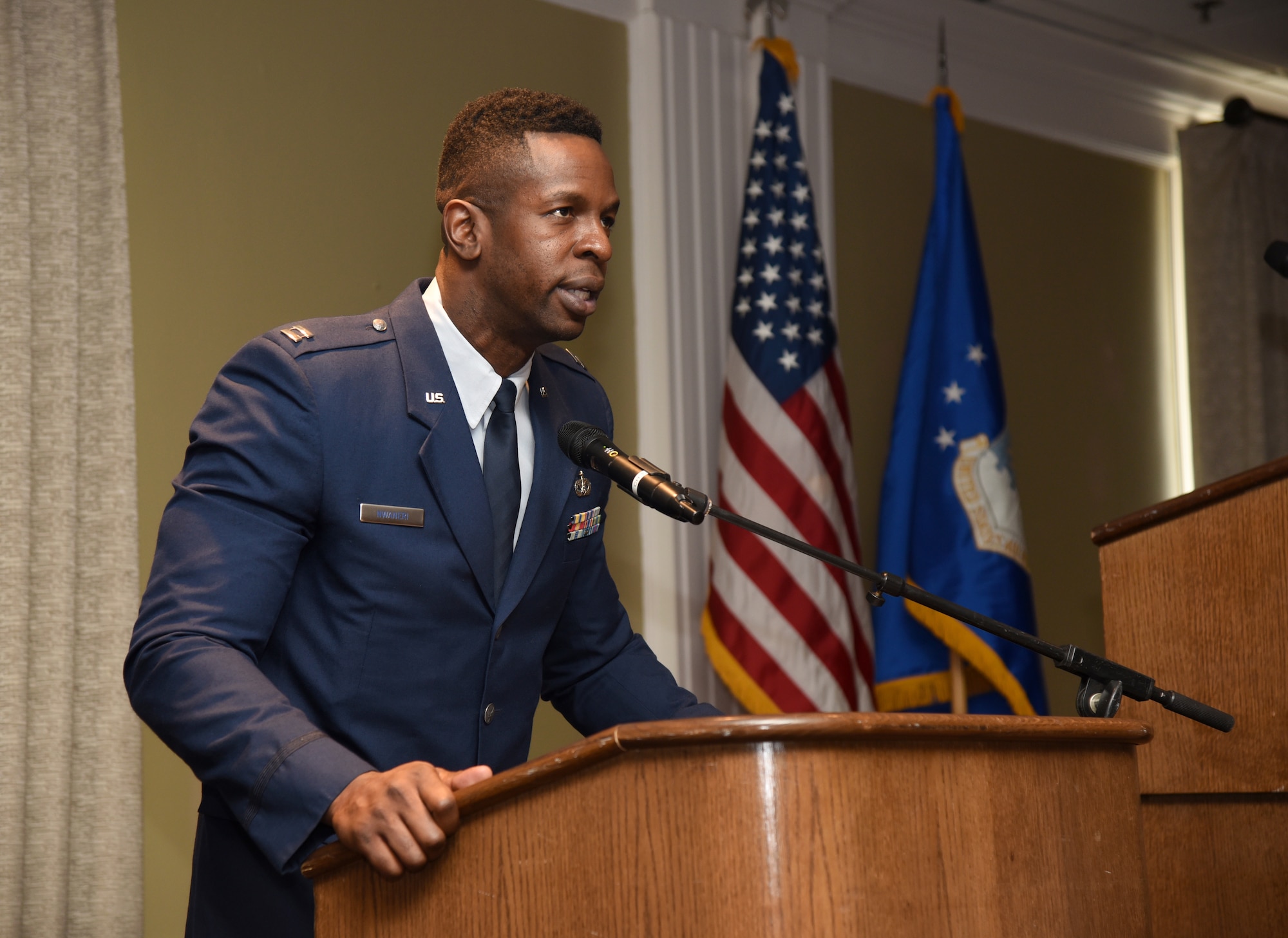 Chaplain (Capt.) Okechukwu Nwaneri gave the invocation at the Black History Month Luncheon Feb. 21. He also presented a donation to the Fifth Street Missionary Baptist Church on behalf of the Tinker African American Heritage Council.