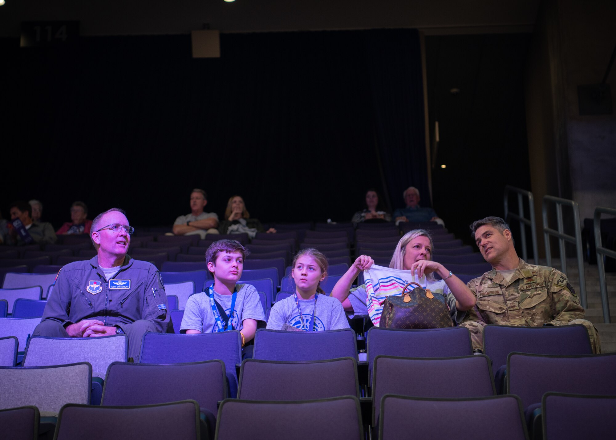 Brig. Gen. Todd Canterbury, 56th Fighter Wing commander and Chief Master Sgt. Ronald Thompson, 56th FW command chief, sit with their families at a Grand Canyon University basketball game, Feb. 27, 2019 in Phoenix, Ariz.