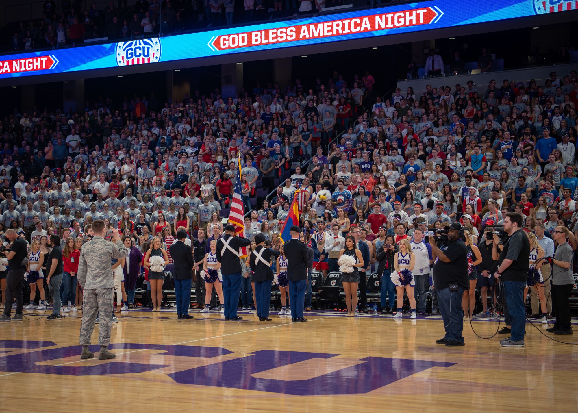 Senior Airman Timothy Orr, 944th Operations Group, Detachment 2 aviation resource manager, sings “God Bless America” before a Grand Canyon University basketball game, Feb. 27, 2019 in Phoenix, Ariz.