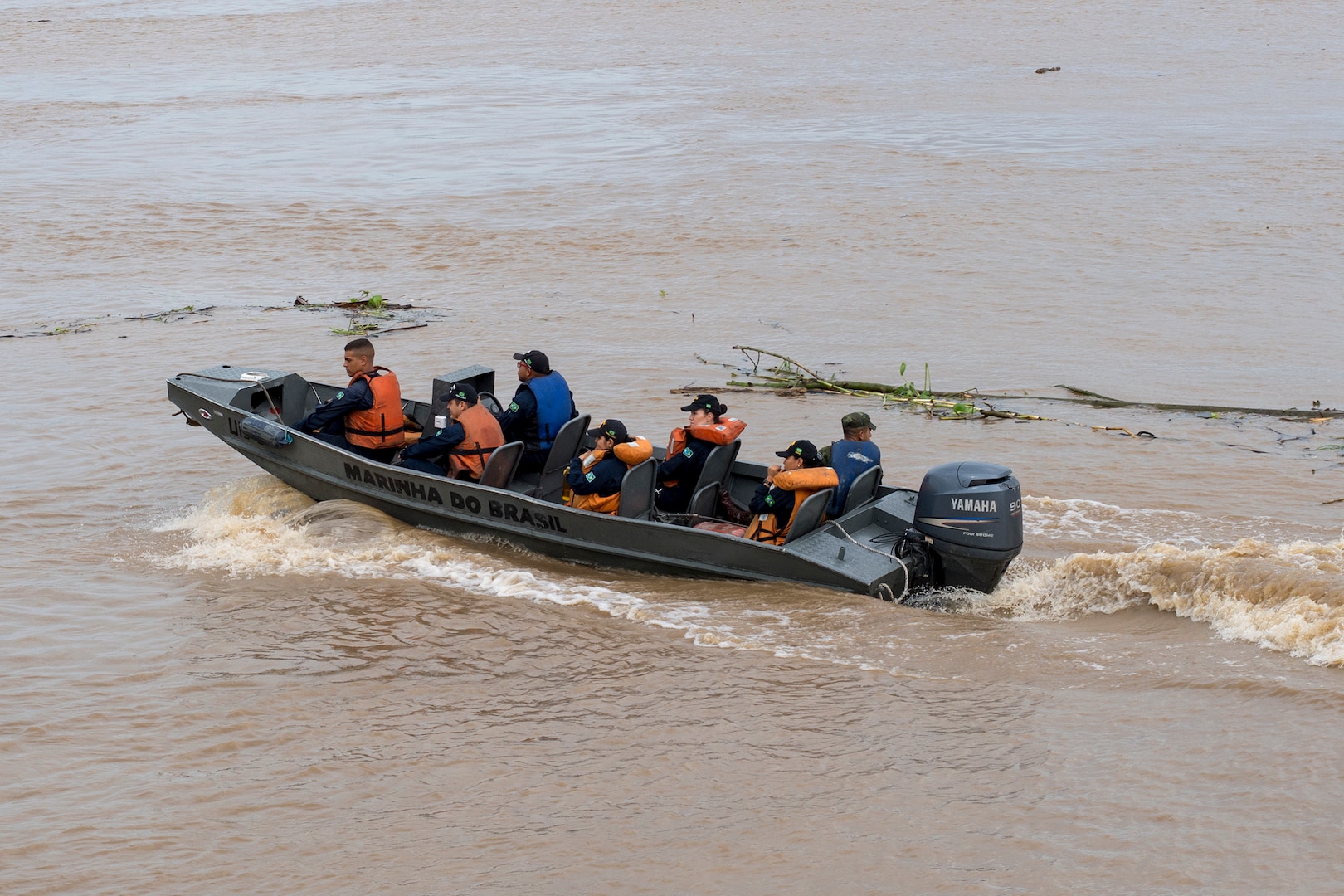 A small boat from Brazilian navy hospital ship NAsH Carlos Chagas (U 19) departs the ship to transport residents of Prainha, Brazil to Chagas for a medical clinic, Feb. 26.