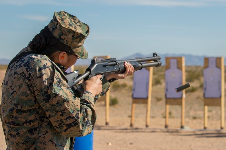 U.S. Marines with the Provost Marshal's Office (PMO), Headquarters and Headquarters Squadron (H&HS), Marine Corps Air Station (MCAS) Yuma, engage targets during a law enforcement (LE) range qualification on MCAS Yuma Ariz., Feb. 28, 2019. The LE qualification is specific to military police personnel, including several different shooting methods with both the Beretta M9 pistol and Benelli 12 gauage shotgun. (U.S. Marine Corps photo by Sgt. Allison Lotz)