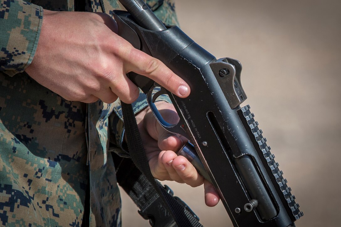 U.S. Marines with the Provost Marshal's Office (PMO), Headquarters and Headquarters Squadron (H&HS), Marine Corps Air Station (MCAS) Yuma, engage targets during a law enforcement (LE) range qualification on MCAS Yuma Ariz., Feb. 28, 2019. The LE qualification is specific to military police personnel, including several different shooting methods with both the Beretta M9 pistol and Benelli 12 gauage shotgun. (U.S. Marine Corps photo by Sgt. Allison Lotz)