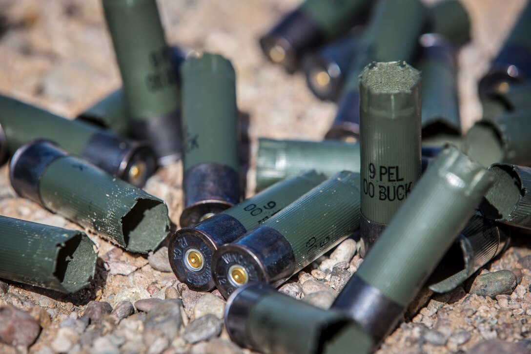 U.S. Marines with the Provost Marshal's Office (PMO), Headquarters and Headquarters Squadron (H&HS), Marine Corps Air Station (MCAS) Yuma, engage targets during a law enforcement (LE) range qualification on MCAS Yuma Ariz., Feb. 28, 2019. The LE qualification is specific to military police personnel, including several different shooting methods with both the Beretta M9 pistol and Benelli 12 gauage shotgun. (U.S. Marine Corps photo by Sgt. Allison Lotz)