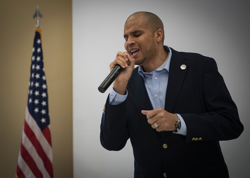 Toby Housey, 628th Air Base Wing equal opportunity director, sings “Change Is Gonna Come” for attendees of the 2019 National African American Black History Program Celebration Feb 27, 2019, at Joint Base Charleston’s Chapel Annex in Charleston, S.C.