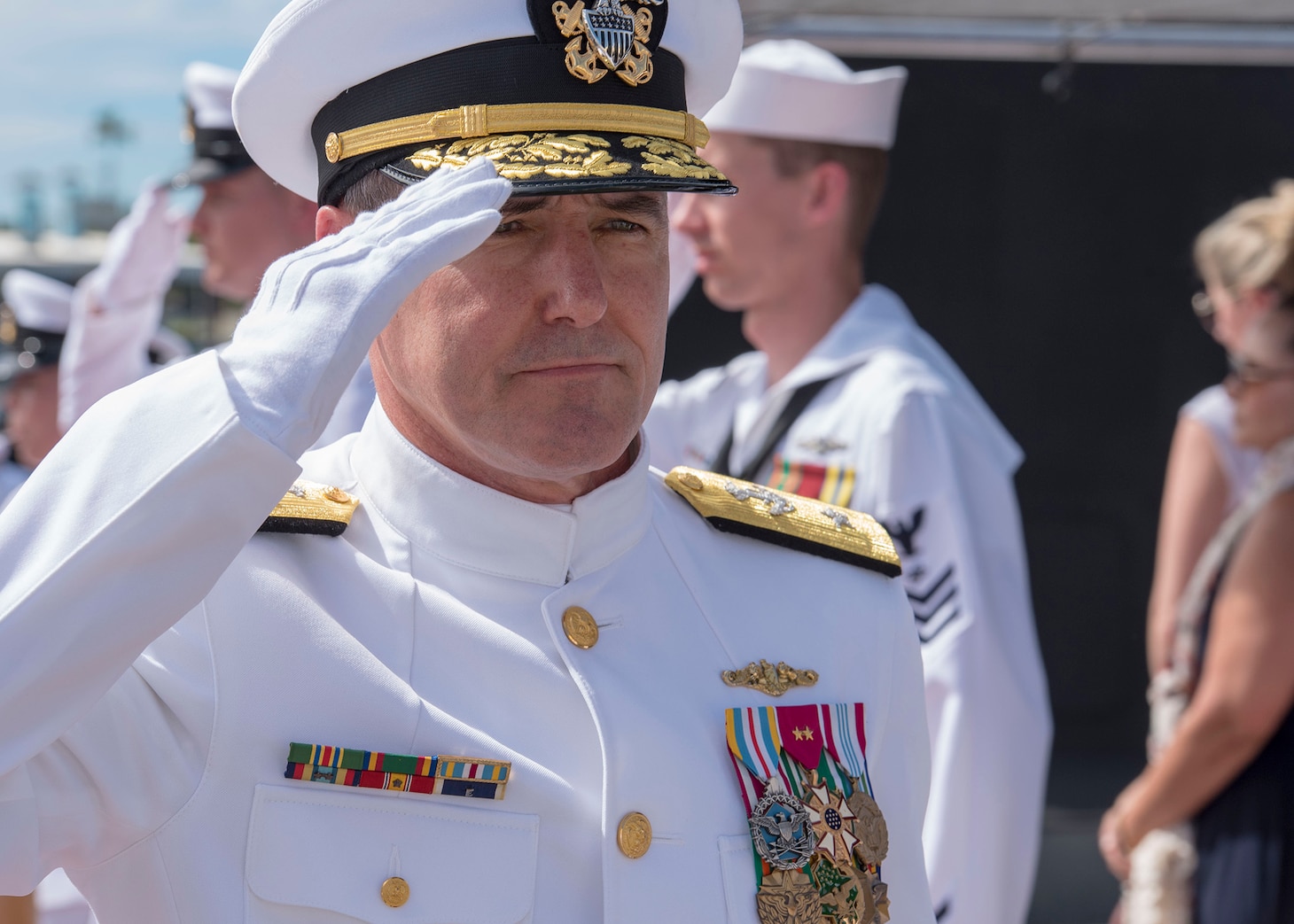 PEARL HARBOR (Feb. 21, 2019) - Rear Adm. Blake Converse, commander, Submarine Force, U.S. Pacific Fleet (COMSUBPAC), salutes during the COMSUBPAC change of command ceremony aboard the Virginia-class fast attack submarine USS Mississippi (SSN 782) in Joint Base Pearl Harbor-Hickam. (U.S. Navy photo by Mass Communication Specialist 2nd Class Shaun Griffin/Released)