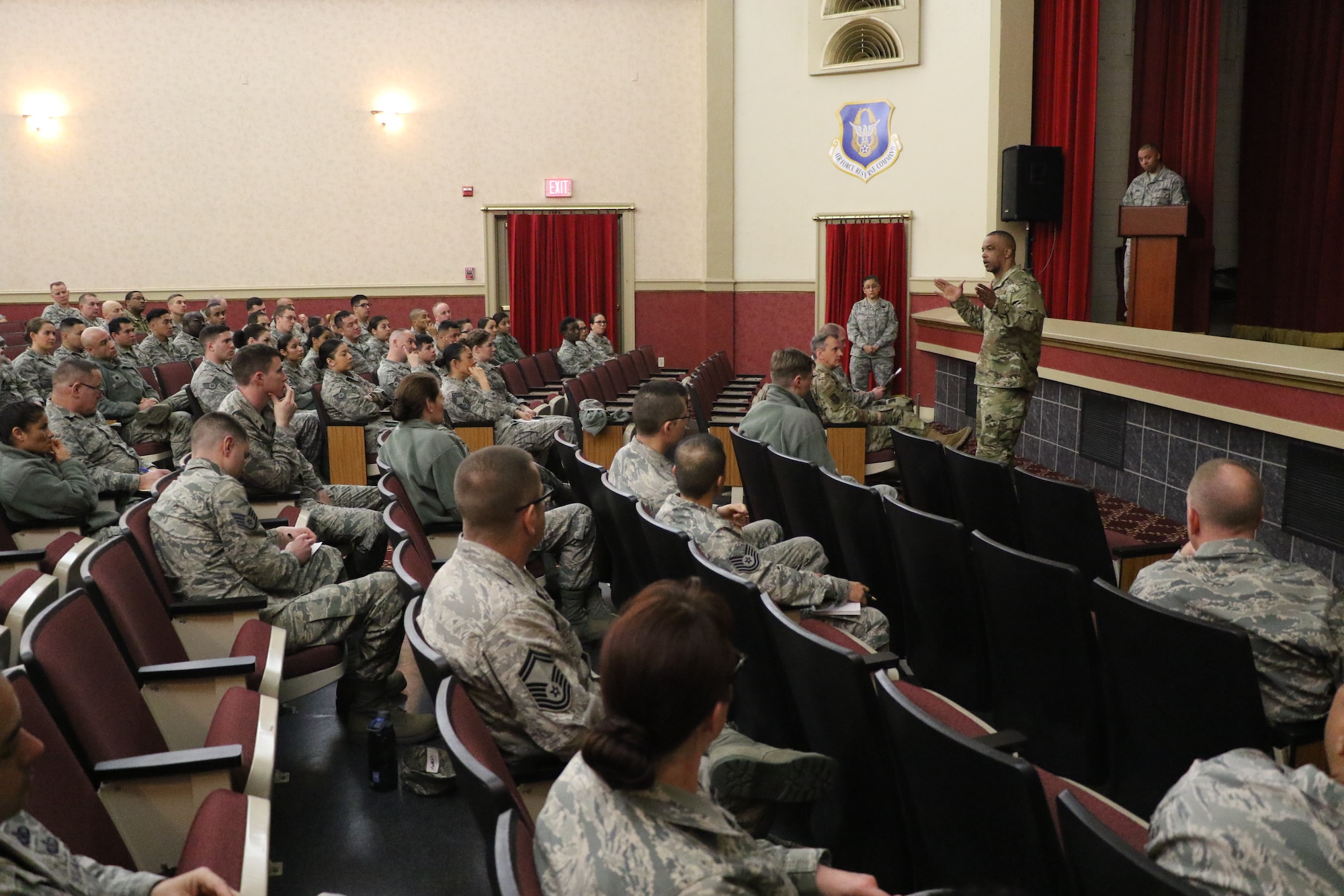 U.S. Air Force Chief Master Sgt. Timothy White, command chief, 4AF, March Air Reserve Base, addresses 452nd Air Mobility Wing Reserve Citizen Airmen during an enlisted all-call at the Cultural Resource Center here Feb. 10, 2019.