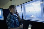 File photo: of a Navy officer standing the officer of the deck watch in the Office of Naval Research Fleet Integrated Synthetic Training and Testing Facility (FIST2FAC), which allows Sailors to interact with artificially intelligent synthetic forces in verious settings.
