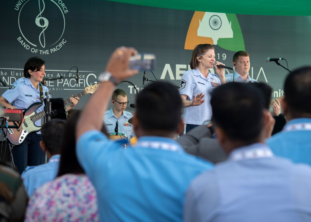 U.S. Air Force Band of the Pacific members perform for a crowd during Aero India 2019, at Air Force Station Yelahanka, Bengaluru, India, Feb. 23, 2019.