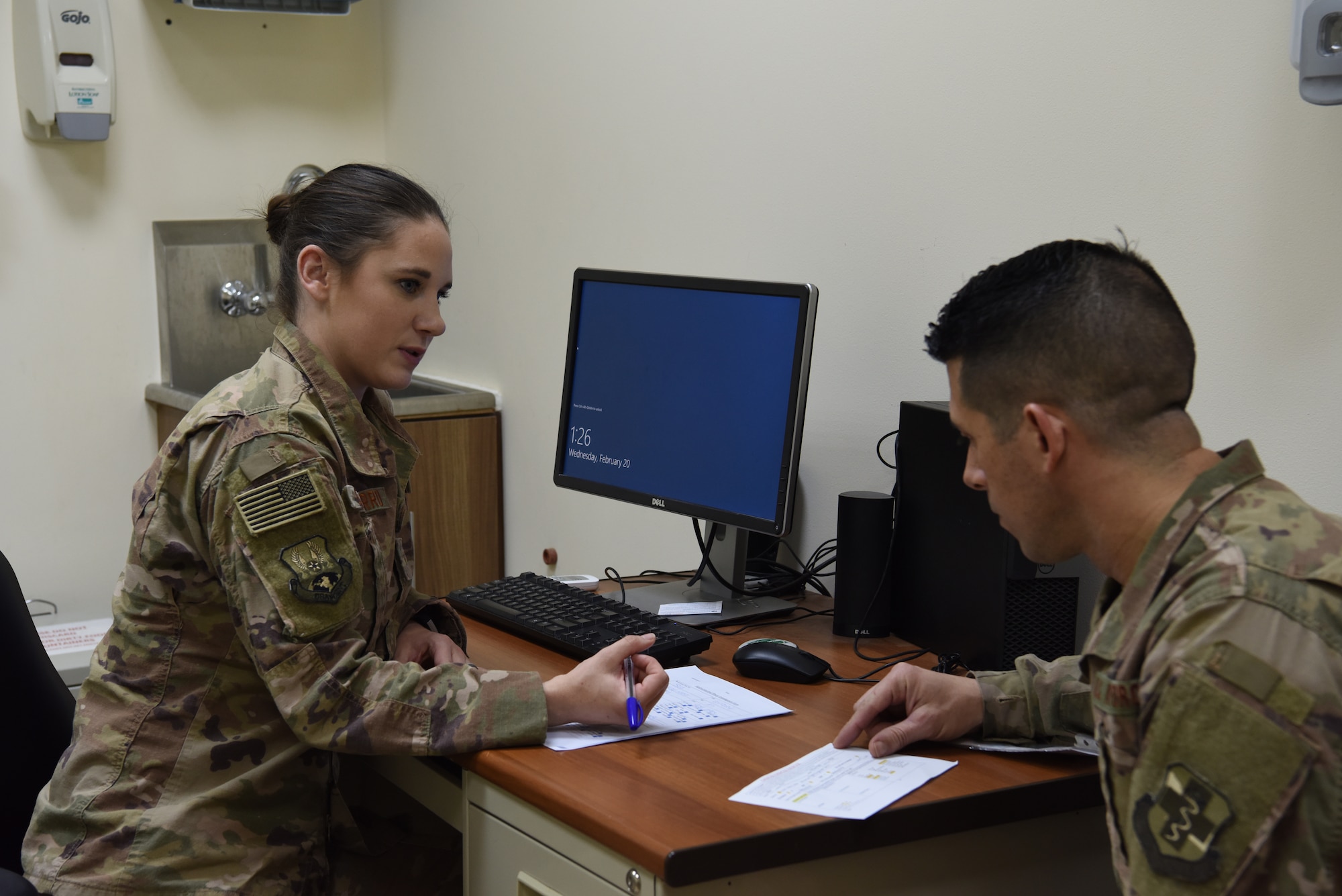 Staff Sgt. Casey Gasbarro, 380th Expeditionary Medical Group flight and operational medical technician, examine a simulated patient’s evaluation during the public health exercise at Al Dhafra Air Base, United Arab Emirates, Feb 18-22, 2019.