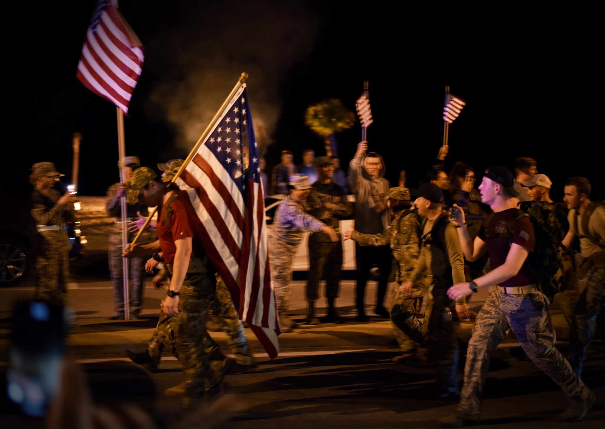 Airmen from the 352nd Battlefield Airmen Training Squadron, Second Air Force and 81st Training Wing leadership join a team of Special Tactics Airmen ruck marching through Biloxi, Mississippi March 1, 2019. Twenty Special Tactics Airmen ruck from Medina Annex at Lackland Air Force Base, Texas, to Hurlburt Field, Florida, to pay tribute to Staff Sgt. Dylan J. Elchin, who was killed in Afghanistan on Nov. 27, 2018, and 19 other Special Tactics Airmen who have been killed in action since 9/11. The ruck march takes ST members across five states and 830 miles. (U.S. Air Force photo by Master Sgt. Ryan Crane)