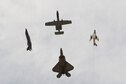 A U.S. Air Force A-10 Thunderbolt II, F-22 Raptor, F-35 Lightning and an F-86 Sabre fly in formation together over Davis-Monthan Air Force Base, Ariz., March 2, 2019.