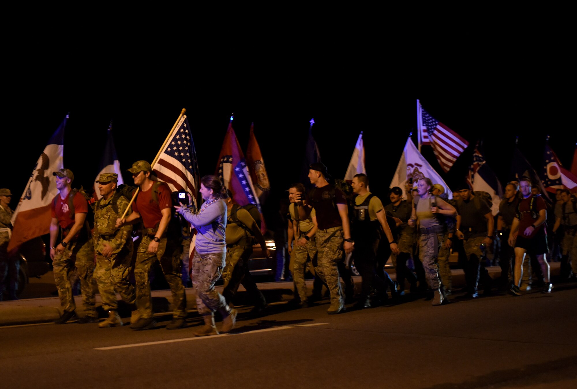 Airmen from the 352nd Battlefield Airmen Training Squadron Detachment 1, Second Air Force and 81st Training Wing leadership join a team of Special Tactics Airmen ruck marching through Biloxi, Mississippi March 1, 2019. Twenty Special Tactics Airmen ruck from Medina Annex at Lackland Air Force Base, Texas, to Hurlburt Field, Florida, to pay tribute to Staff Sgt. Dylan J. Elchin, who was killed in Afghanistan on Nov. 27, 2018, and 19 other Special Tactics Airmen who have been killed in action since 9/11. The ruck march takes ST members across five states and 830 miles. (U.S. Air Force photo by Master Sgt. Ryan Crane)
