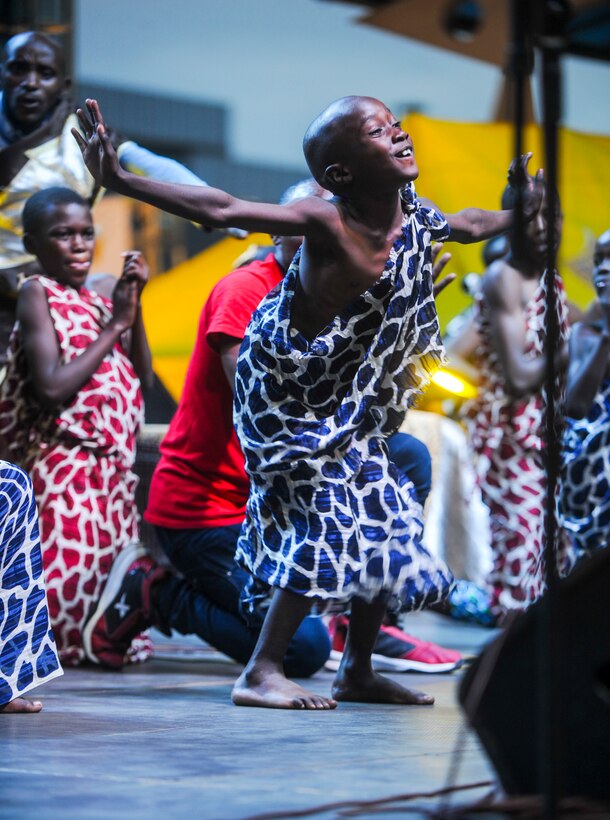A member of the LEAF Junior Troupe performs a dance during a Tour du Rwanda concert in Kigali, Rwanda, March 2, 2019. LEAF Community Arts is an international non-profit organization whose mission is to build community and connect cultures through arts such as music and dance. (U.S. Air Force photo by Tech. Sgt. Timothy Moore)