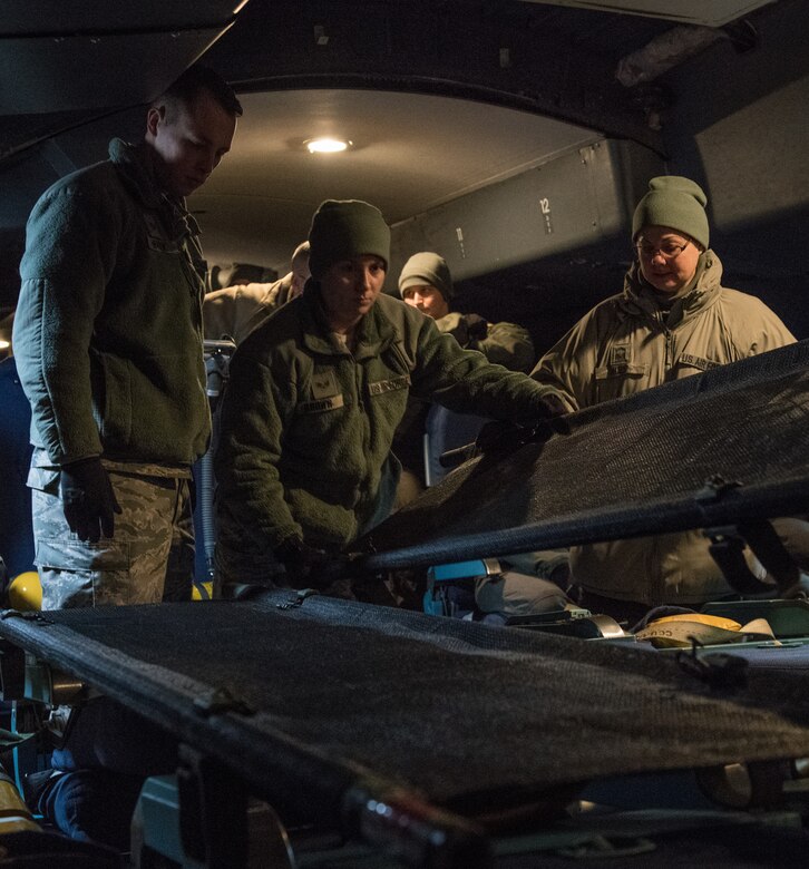 Citizen Airmen with 932nd Aeromedical Evacuation Squadron, practice loading litters on to the C-5M Super Galaxy, March 2, 2019, Scott Air Force Base, Illinois. The training prepares AES members to become more efficient in transferring patients on the C-5M Super Galaxy. (U.S. Air Force photo by Senior Airman Brooke Deiters)