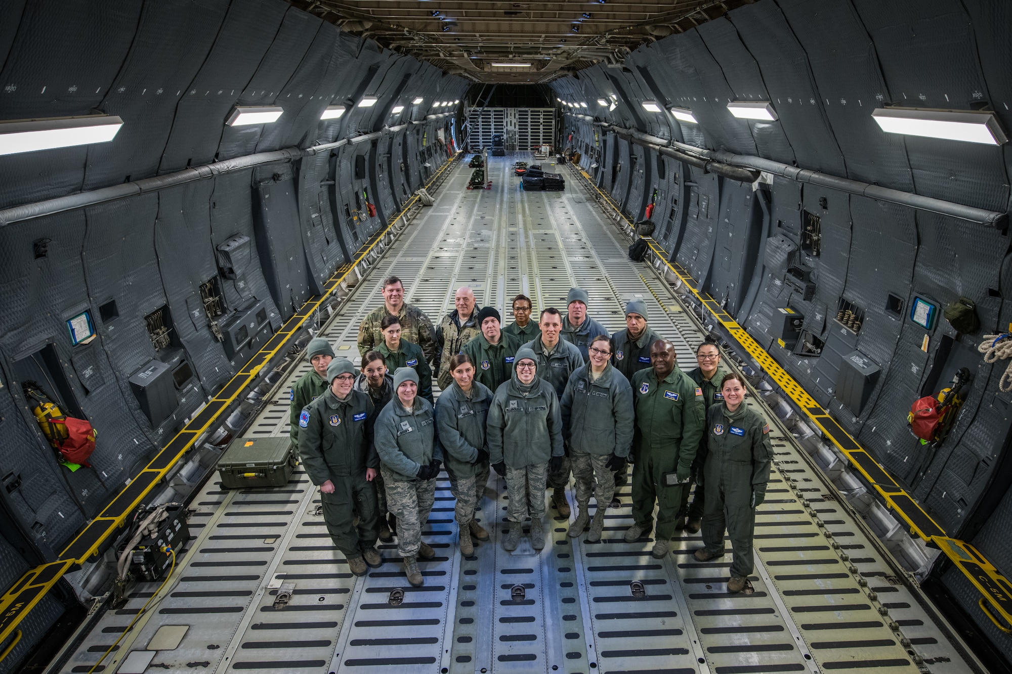 Citizen Airmen with 932nd Airlift Wing, Aeromedical Evacuation Squadron, pose for a photo after initial training on the C-5M Super Galaxy,  March 2, 2019, Scott Air Force Base, Illinois. The training prepares AES members to become more efficient in transferring patients on the C-5M Super Galaxy. (U.S. Air Force photo by Senior Airman Brooke Deiters)