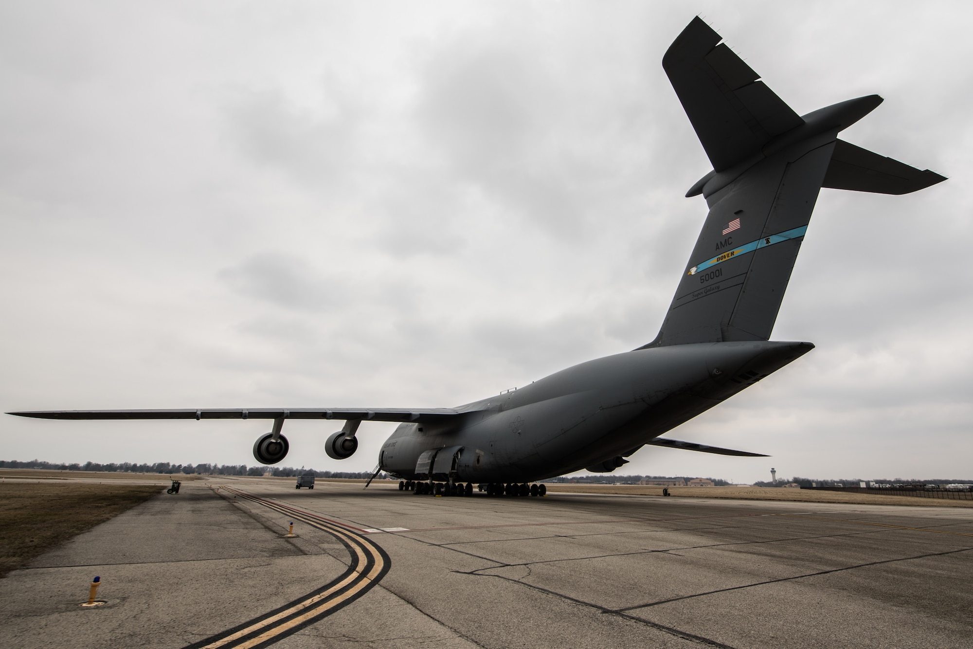 The C-5M Super Galaxy’s crew from the 142nd Airlift Squadron, Aeromedical Evacuation Squadron,  train with the 932nd Airlift Wing AES on patient loading procedures, March 2, 2019, Scott Air Force Base, Illinois. The training prepares AES members to become more efficient in transferring patients on the C-5M Super Galaxy. (U.S. Air Force photo by Senior Airman Brooke Deiters)