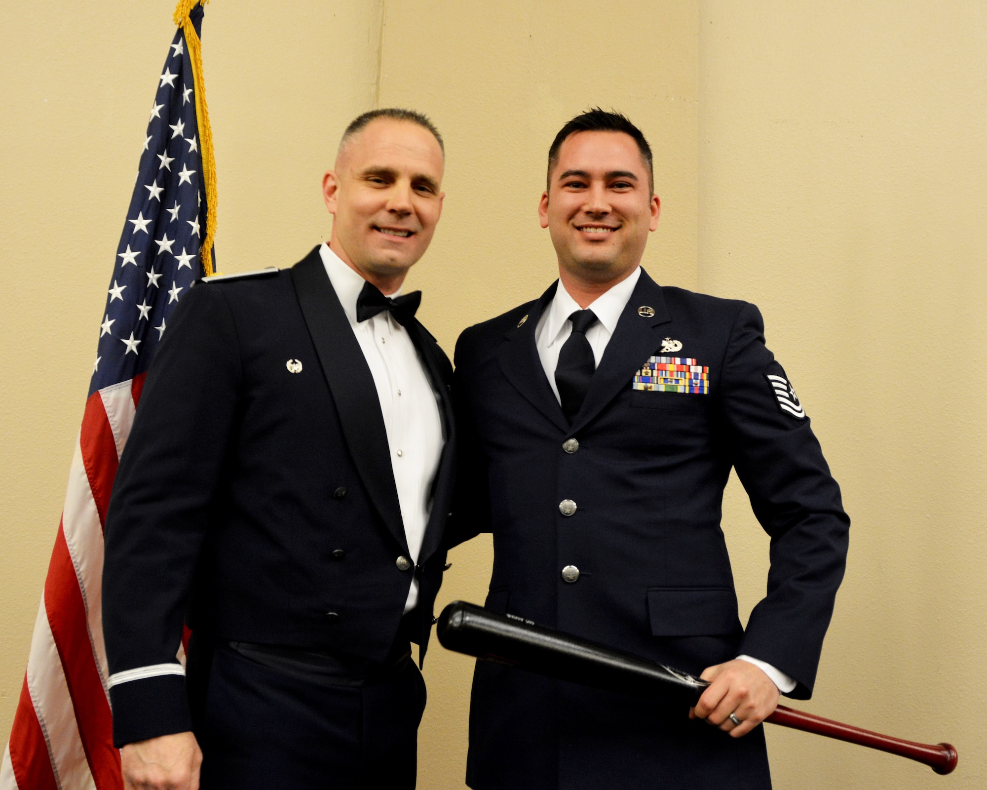 Maj. Randy Starnes, 507th Aircraft Maintenance Squadron commander, presents the 2018 507th AMXS Heavy Hitter Award to Tech. Sgt. Michael Dunning March 2, 2019, Midwest City, Oklahoma. (U.S. Air Force photo by Maj. Jon Quinlan)