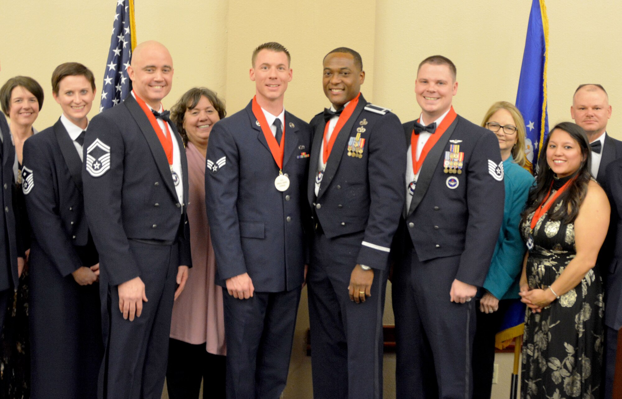 The 2018 507th Air Refueling Wing annual award winners pose for a photo March 2, 2019, at the Sheraton Reed Conference Center in Midwest City, Oklahoma. Front row: Tasha Windisch, Tinker Federal Credit Union; Master Sgt. Lindsay Newton; Senior Master Sgt. Justin Henry; Jan Davis, Moore Chamber of Commerce and TFCU; Senior Airman Preston Baker, 1st Lt. Adrian Mack; Tech. Sgt. Benjamin Alexander; Kathy Gillette, Moore Chamber of Commerce; Jennifer Smith, and Chief Master Sgt. David Dickson, 507th ARW command chief. (U.S. Air Force photo Maj. Jon Quinlan)