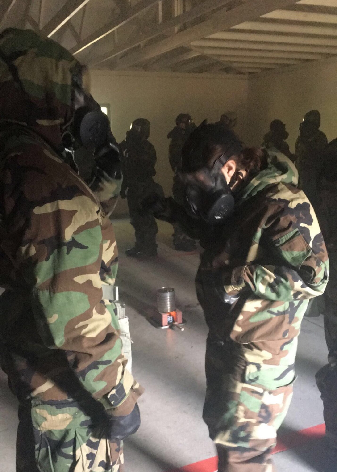Members of Team McChord participate in the Mask Confidence Course