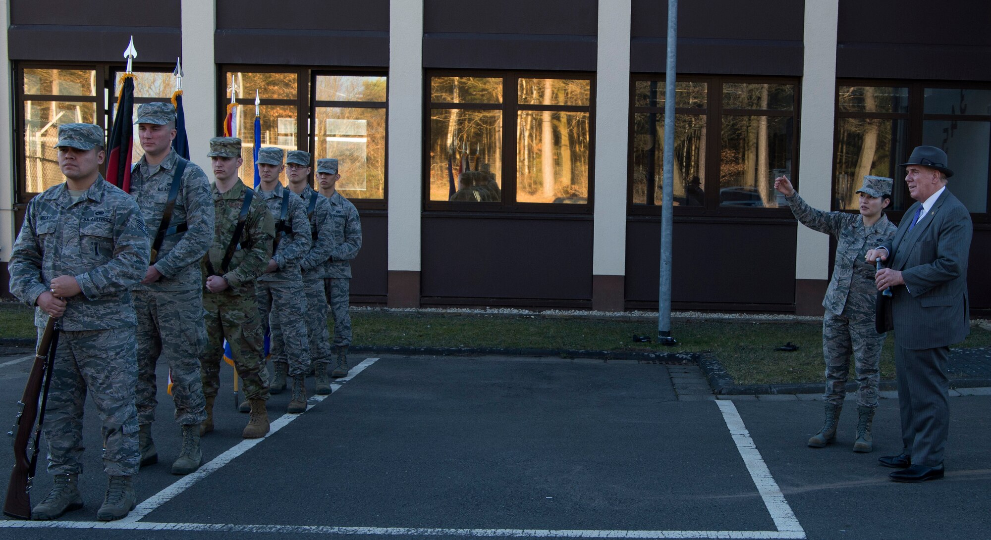 The honor guard performed a demonstration during Evans' visit to show what they do and their precision when performing