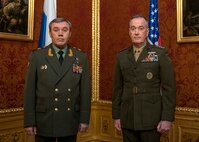 Marine Corps Gen. Joe Dunford, chairman of the Joint Chiefs of Staff, speaks with Russian Gen. Valery Gerasimov, chief of the General Staff of the Armed Forces of Russia, during a meeting at the Winter Palace in Vienna, Austria, March 4, 2019. (DoD Photo by Navy Petty Officer 1st Class Dominique A. Pineiro)