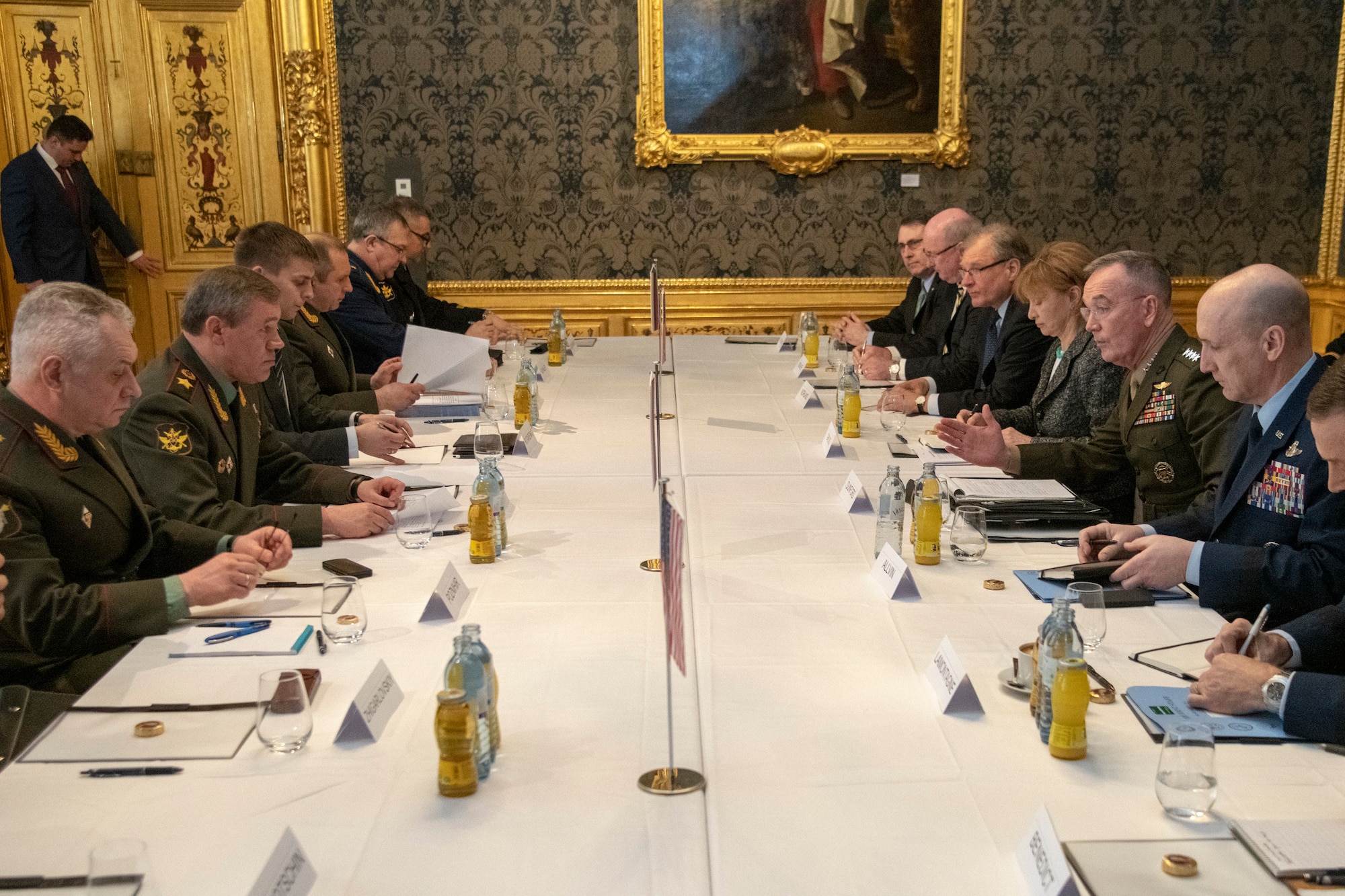 Marine Corps Gen. Joe Dunford, chairman of the Joint Chiefs of Staff, speaks with Russian Gen. Valery Gerasimov, chief of the General Staff of the Armed Forces of Russia, during a meeting at the Winter Palace in Vienna, Austria, March 4, 2019. (DoD Photo by Navy Petty Officer 1st Class Dominique A. Pineiro)