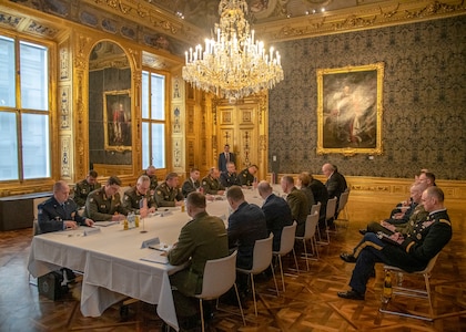 Marine Corps Gen. Joe Dunford, chairman of the Joint Chiefs of Staff, speaks with Russian Gen. Valery Gerasimov, chief of the General Staff of the Armed Forces of Russia, during a meeting at the Winter Palace in Vienna, Austria, March 4, 2019. (DoD Photo by Navy Petty Officer 1st Class Dominique A. Pineiro)