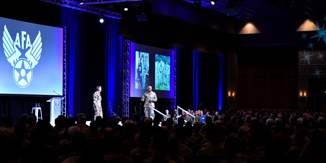 Air Force Chief of Staff Gen. David L. Golfein and Chief Master Sgt. of the Air Force Kaleth O. Wright speak during the Air Force Association's Air Warfare Symposium in Orlando, Florida, March 1, 2019. During their remarks Goldfein and Wright highlighted the importance of inspirational and courageous leadership. (U.S. Air Force photo by Wayne Clark)
