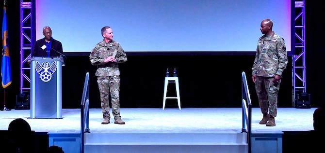 Air Force Chief of Staff Gen. David L. Golfein and Chief Master Sgt. of the Air Force Kaleth O. Wright speak during the Air Force Association's Air Warfare Symposium in Orlando, Fla., March 1, 2019. During their remarks Goldfein and Wright highlighted the importance of inspirational and courageous leadership. (U.S. Air Force photo by Wayne Clark)