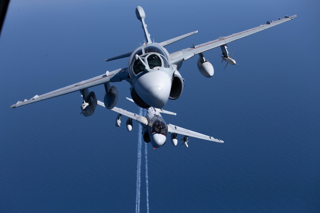 Two U.S. Marine Corps EA-6B Prowler assigned to Marine Tactical Electronic Warfare Squadron 2, fly off the coast of North Carolina, Feb 28, 2019. VMAQ-2 is conducting its last flights prior to their deactivation on March 8, 2019. VMAQ-2 is a subordinate unit to Marine Aircraft Group 14, 2nd Marine Aircraft Wing.