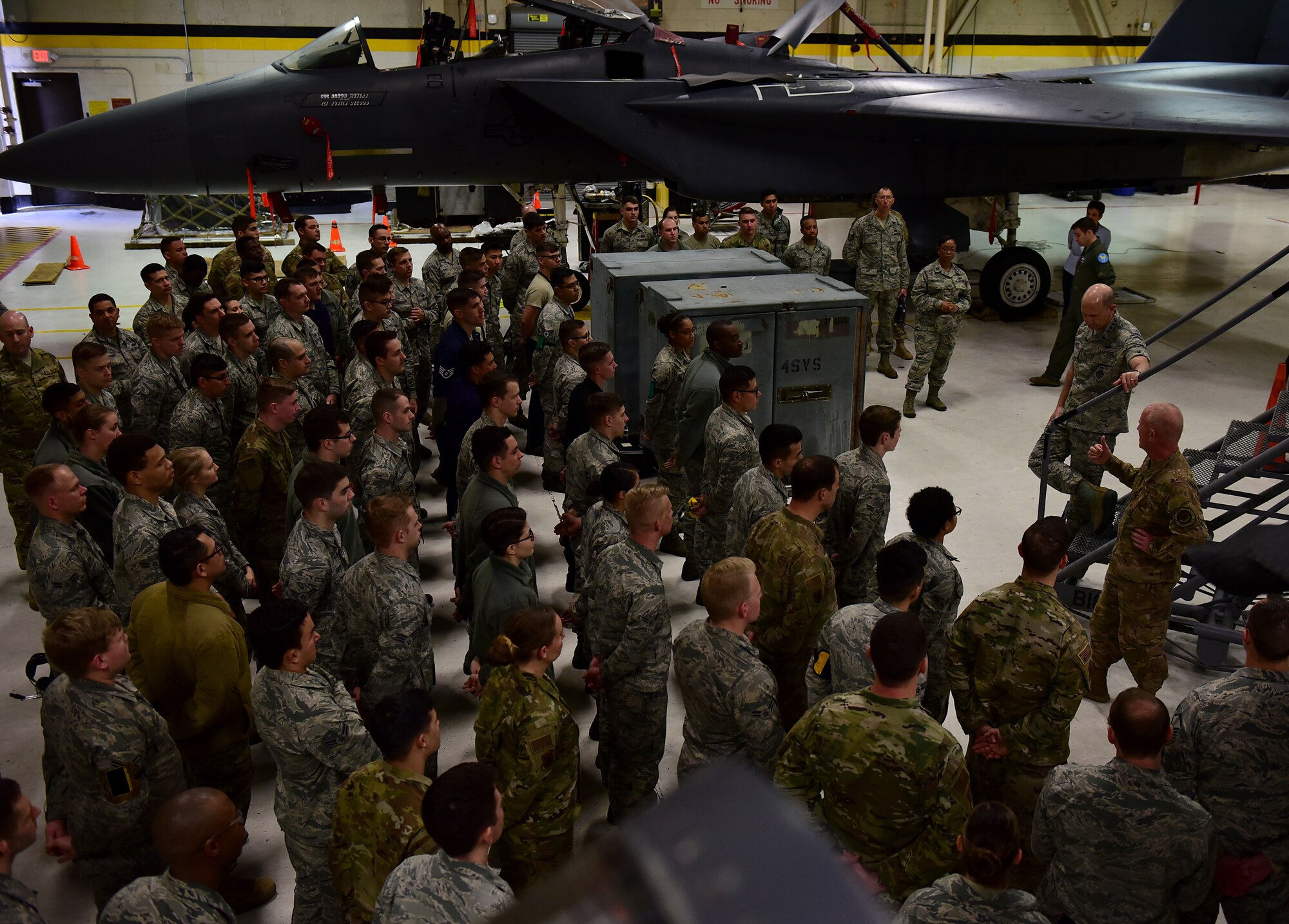 From right, Gen. Mike Holmes, commander of Air Combat Command, and Chief Master Sgt. Frank Batten, command chief of ACC, discuss possible solutions to challenges that Airmen are facing with members of the 336th Aircraft Maintenance Unit, Feb. 26, 2019, at Seymour Johnson Air Force Base, North Carolina. During the visit, Airmen had the opportunity to ask Holmes and Batten questions about personnel topics and the future of the Air Force. (U.S. Air Force photo by Senior Airman Kenneth Boyton)