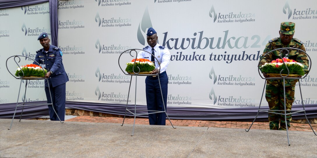 Rwanda Air Force Capt. Emmanuel Rutebuka, left, U.S. Air Force Col. Stephen Hughes, center, and Ghana Air Force Squadron Leader Ishmael Ansah lay down wreaths during a ceremony at the Kigali Genocide Memorial in Kigali, Rwanda, March 4, 2019. The wreath laying ceremony was part of a cultural visit for the African Partnership Flight Rwanda. (U.S. Air Force photo by Tech. Sgt. Timothy Moore)