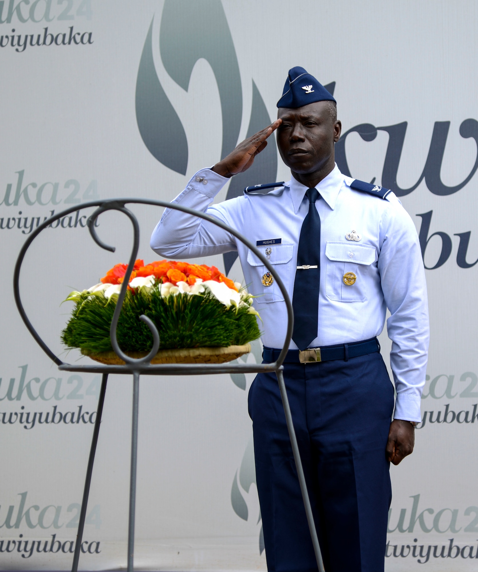 U.S. Air Force Col. Stephen Hughes, deputy director of U.S. Air Forces in Europe-Air Forces Africa Plans, Programs, and Analysis, renders a salute during a wreath laying ceremony at the Kigali Genocide Memorial in Kigali, Rwanda, March 4, 2019. Hughes and air force delegates participating in the African Partnership Flight Rwanda visited the memorial as part of a cultural visit. (U.S. Air Force photo by Tech. Sgt. Timothy Moore)