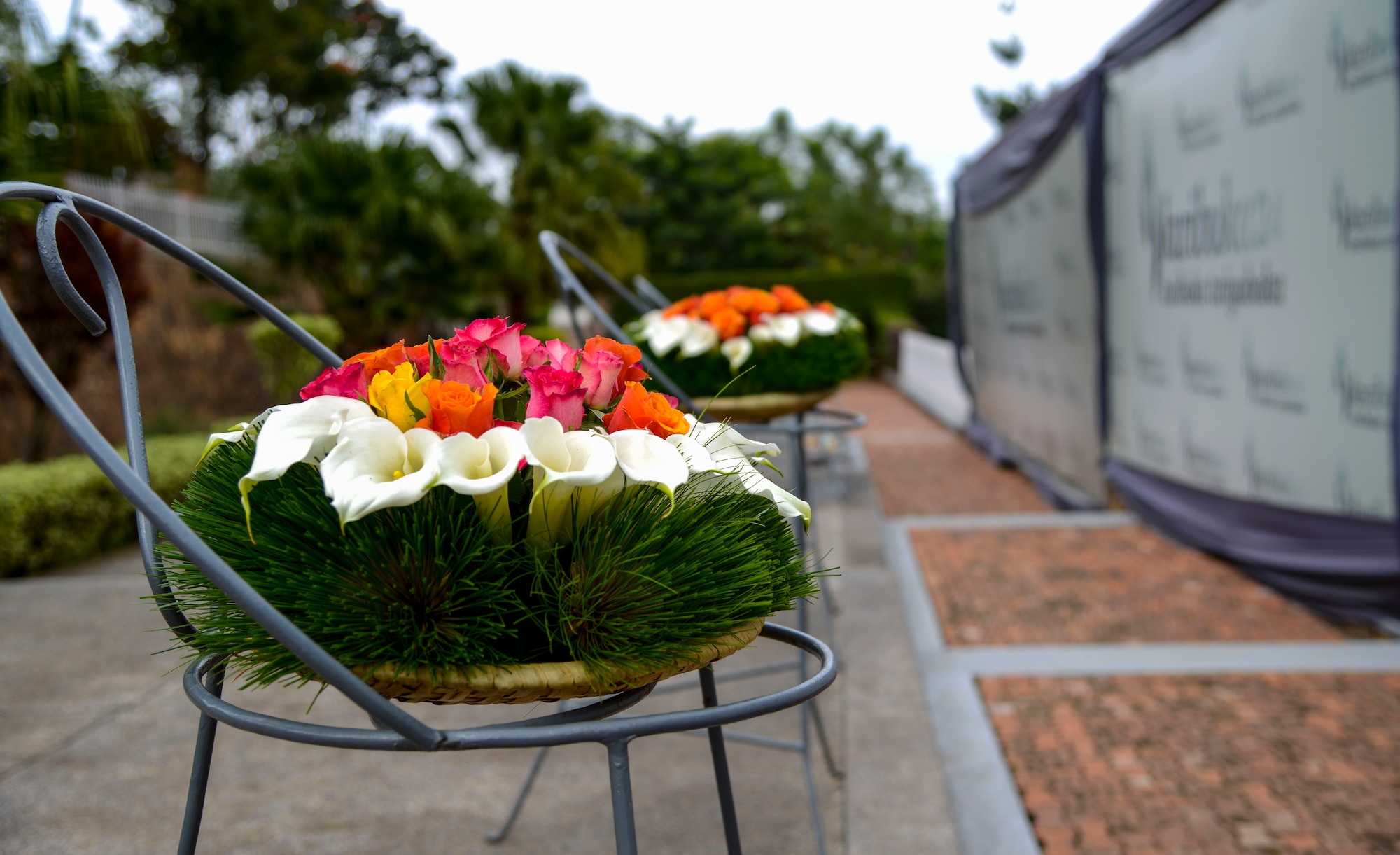 Wreaths rest on stands after a ceremony at the Kigali Genocide Memorial in Kigali, Rwanda, March 4, 2019. Participants in the African Partnership Flight Rwanda took part in the wreath laying ceremony as part of a cultural visit as well as to pay their respects to the approximately 250,000 victims buried there. (U.S. Air Force photo by Tech. Sgt. Timothy Moore)
