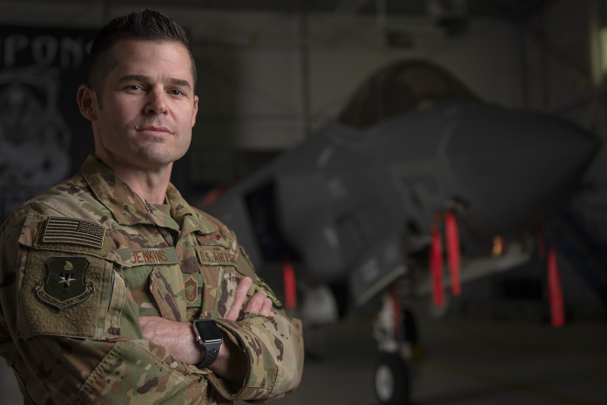 U.S. Air Force Chief Master Sgt. Tony Jenkins, 33rd Operations Group superintendent, stands in front of an F-35A Lightning II assigned to the 33rd Fighter Wing Feb. 19, 2019, at Eglin Air Force Base, Fla. Jenkins was given a second chance early on in his career that shaped his future as an Airman and leader. Twenty years after that second chance at success, he has been selected to serve in the capacity of command chief. (U.S. Air Force photo by Staff Sgt. Peter Thompson)