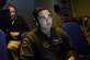 Steven Custis, KC-10 boom operator instructor, watches Airman 1st Class Nicholas Eddings, 32nd Air Refueling Squadron KC-10 Extender boom operator, as he operates the boom in a KC-10 simulator on Joint Base McGuire-Dix-Lakehurst, New Jersey, Dec. 19, 2018. The KC-10 aircrew training simulator facility holds three simulators that allow coordination between boom operators, pilots and flight engineers simultaneously. (U.S. Air Force photo by 1st Lt. Katie Mueller)