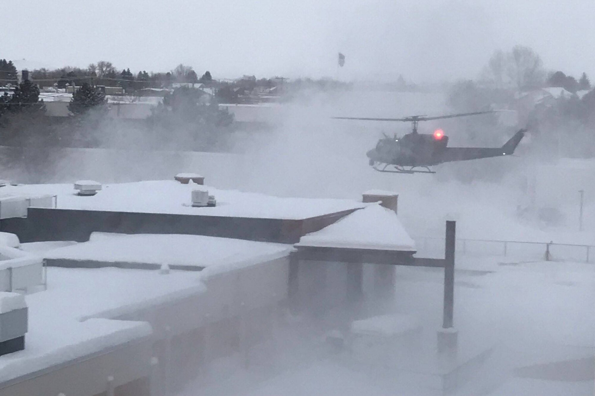 Aircrew from the 40th Helicopter Squadron begin to land at Benefis Hospital in Great Falls after a successful search and rescue March 1, 2019.
