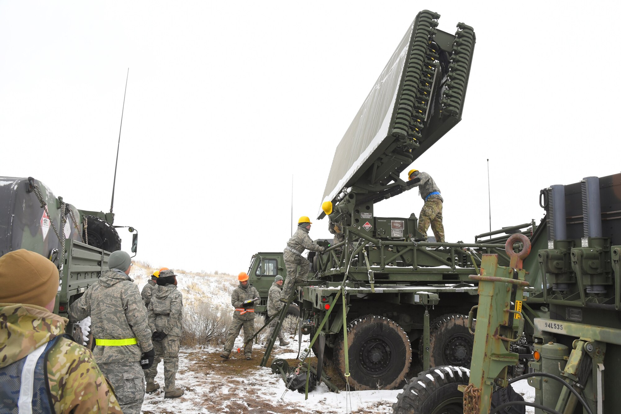 Airmen with the 729th Air Control Squadron set up the radar Feb. 5, 2019, during a readiness exercise at Hill Air Force Base, Utah. The evolution was part of an exercise to mobilize and set up a deployed radar location and control reporting center. (U.S. Air Force photo by Todd Cromar)