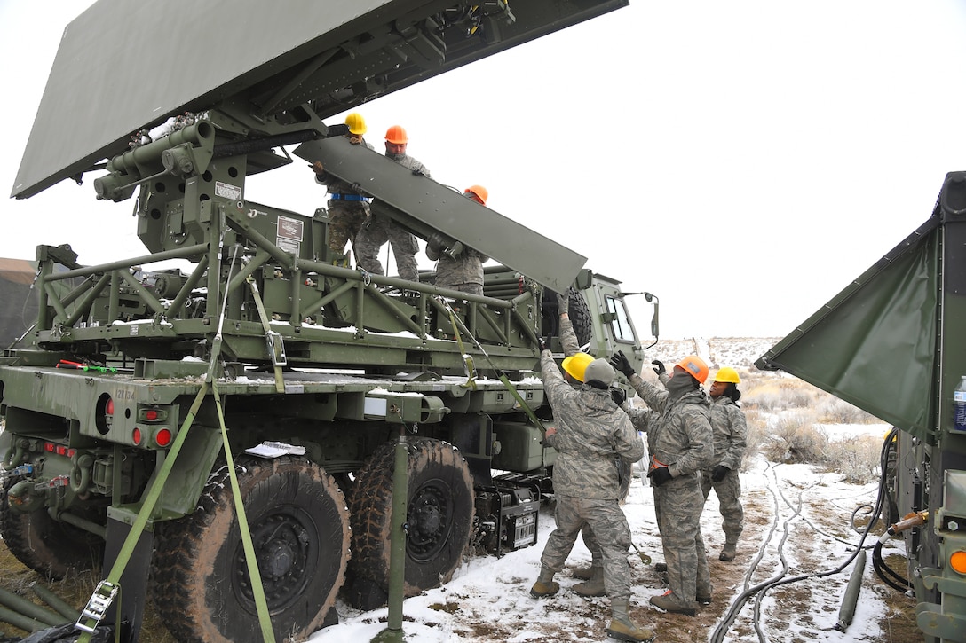 Airmen with the 729th Air Control Squadron set up the radar Feb. 5, 2019, during a readiness exercise at Hill Air Force Base, Utah. The evolution was part of an exercise to mobilize and set up a deployed radar location and control reporting center. (U.S. Air Force photo by Todd Cromar)