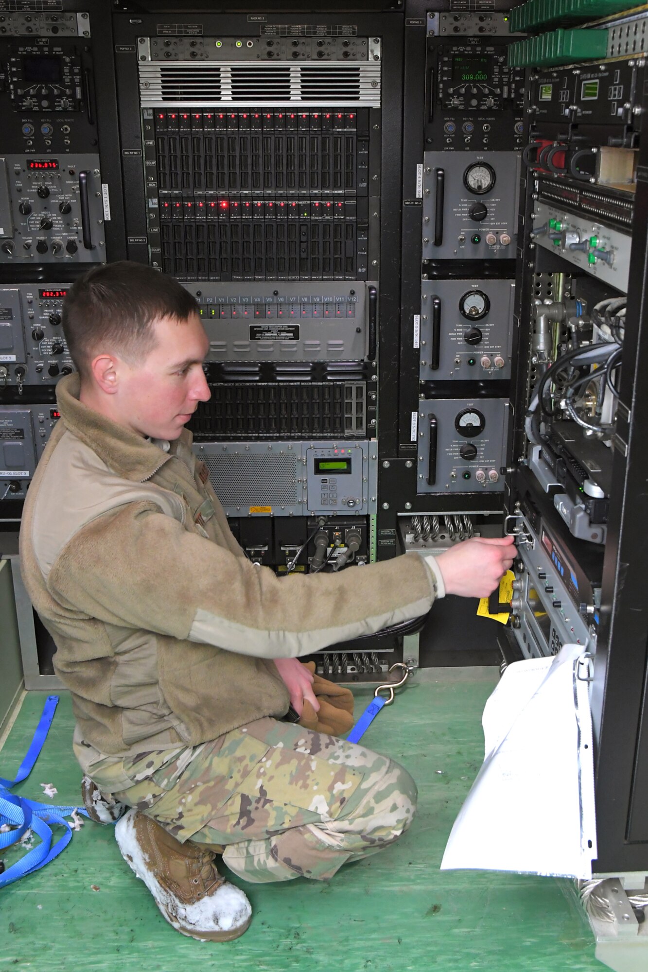 Staff Sgt. Zachary Witt, 729th Air Control Squadron, checks communications equipment Feb. 6, 2019, during a readiness exercise at Hill Air Force Base, Utah. The evolution was part of an exercise to mobilize and set up a deployed radar location and control reporting center. (U.S. Air Force photo by Todd Cromar)
